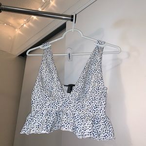 white forever 21 plunge/crop tank with blue flower